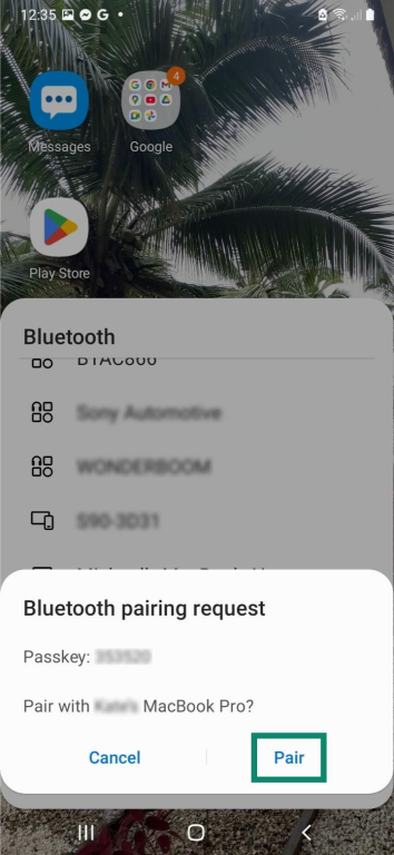 A Bluetooth pairing request on an Android phone. The "Pair" button is highlighted.