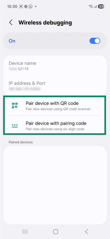 The "Wireless debugging" settings on an Android phone. The "Pair device with QR code" and "Pair device with pairing code" options are highlighted.